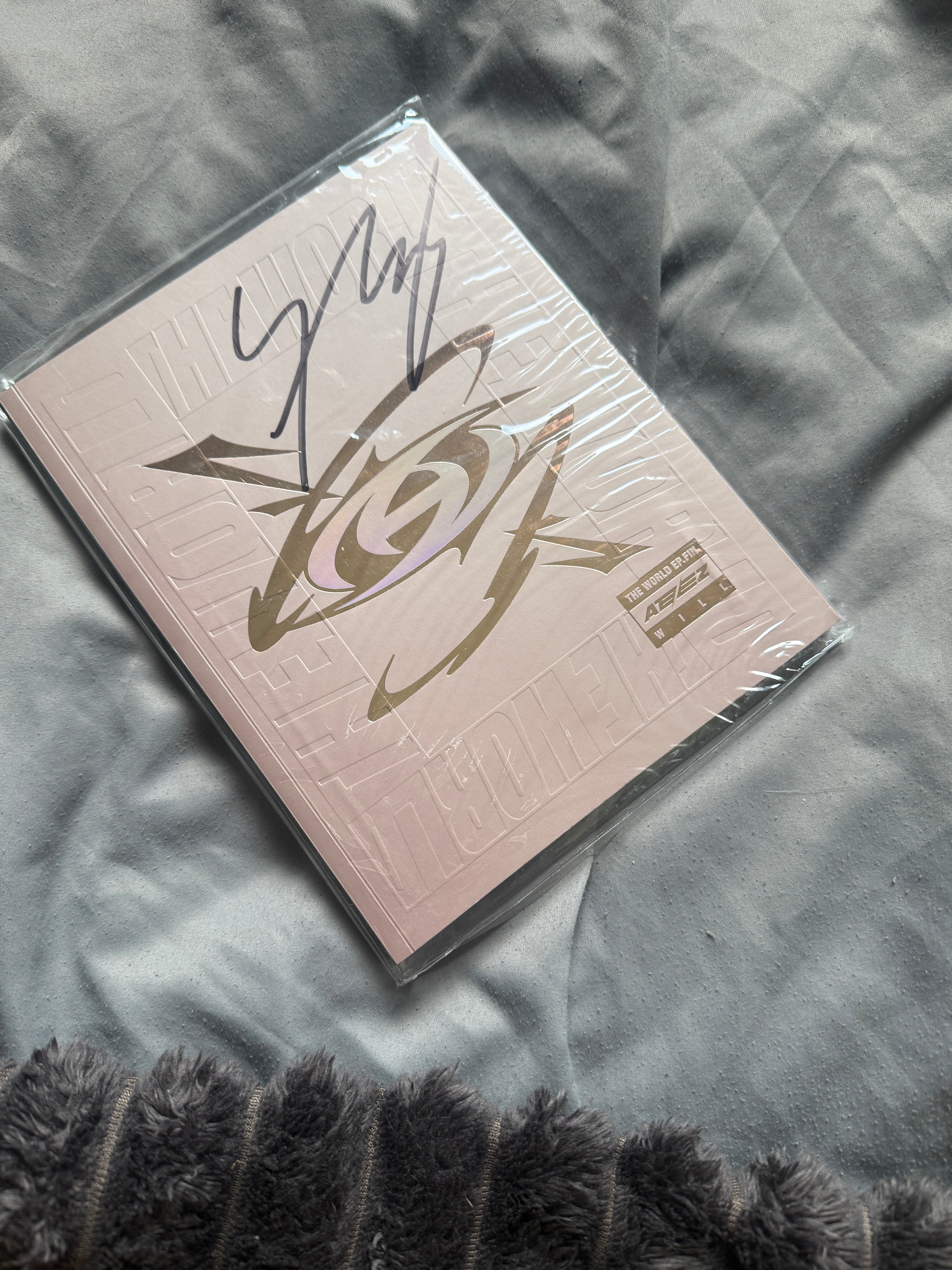 Ateez signée